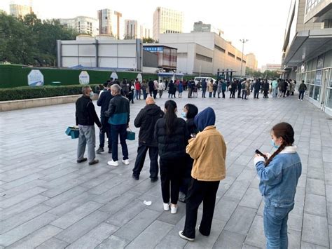 Video shows Chinese residents in long queues for COVID test amid new ...