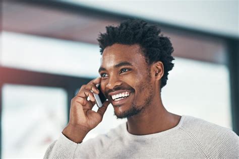 Happy black man and laughing with phone call for funny joke ...