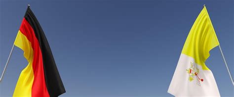 Flags of germany and vatican on flagpoles on the sides on a blue ...