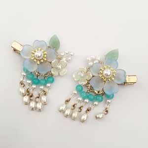 gold color hair clips for kids and girls with blue color flowers and ...