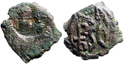 Heraclius AE25 Follis. countermark of Heraclius & son / Monogram. Sicily