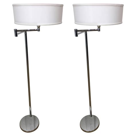 Pair of Nessen Adjustable Swing Arm Floor Lamps at 1stDibs