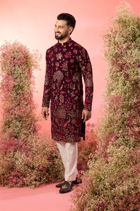 wine chikankari kurta with intricate flora and fauna figures