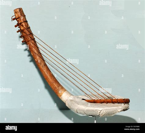5616. A harp like musical instrument , Egypt c. 10th. C. BC Stock Photo ...