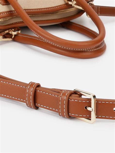 Ash Tan Handheld by IRTH | House of Titan