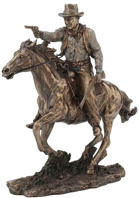 Fighting Cowboy on Horseback with Pistol and Rifle Statue : Amazon.in ...