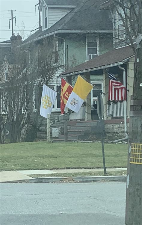 USA flag, Papal flag, and two flags representing the the Kingdom of Jerusalem and the Eastern ...