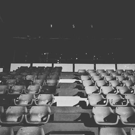 Low angle view of chairs in stadium | Premium Photo