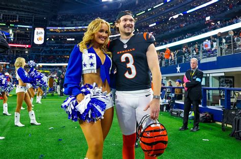 Bengals kicker Cade York kisses Cowboys cheerleader girlfriend Zoe Dale ...