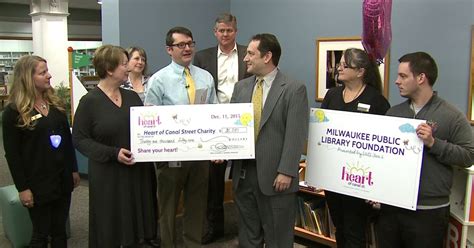Heart of Canal Street: Milwaukee Public Library officials receive check ...