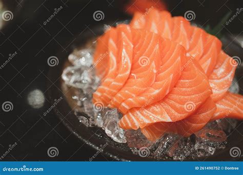 Salmon Sashimi Slice Fresh Serve on Ice. Japanese Traditional Food or ...