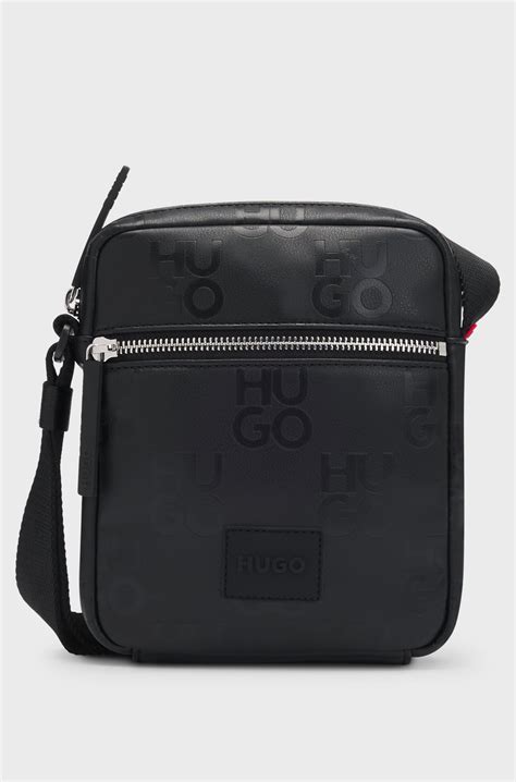 HUGO - Faux-leather reporter bag with stacked-logo pattern - Black