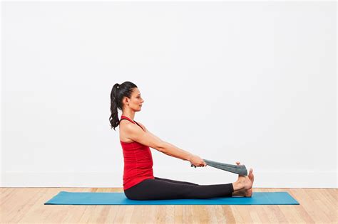 Learn how to use a towel or a belt to help stretch your calf muscles and Achilles' tendons in ...