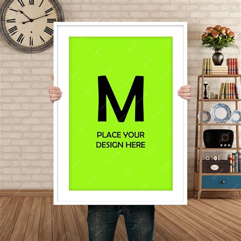 Mockup psd person holding a blank poster for mockups and presentations ...