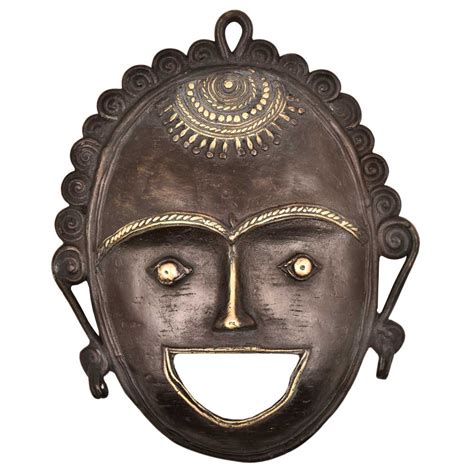 Brass Mask Of A Tribal Lad Laughing Face