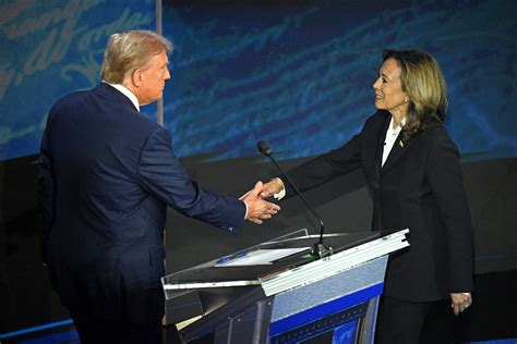Kamala Harris Holding Hand