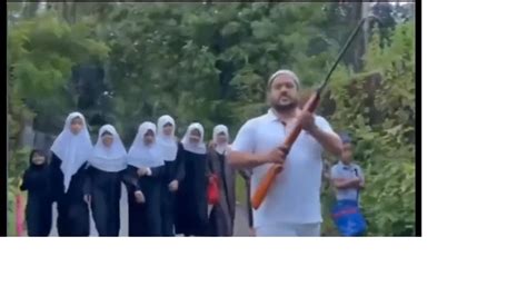 WATCH: Kerala man brandishes rifle while escorting girl students to ...