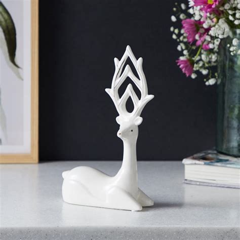 Buy Brighton Ceramic Textured Sitting Reindeer Figurine from Home ...