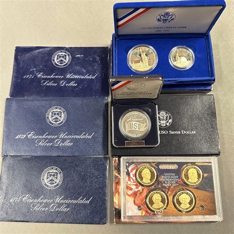 LOT 718 – LOT INCLUDING 3 UNCIRCULATED IKE DOLLARS, (2) 1986 UNITED ...