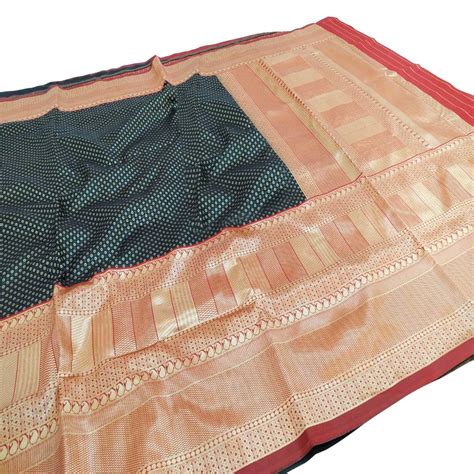 Intricate Teal Blue Colored Fetive Wear Woven Heavy Banarasi Silk Saree