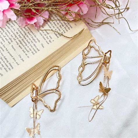 Metal Butterfly Tassle Clutcher – Kinzah Fashion
