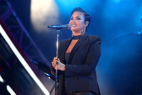 Why was Demi Lovato album cover poster banned by UK regulator?
