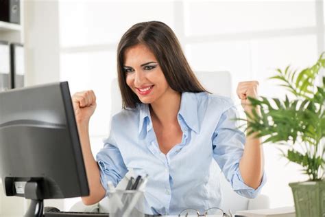 Businesswoman Sitting in Office Stock 的图像结果