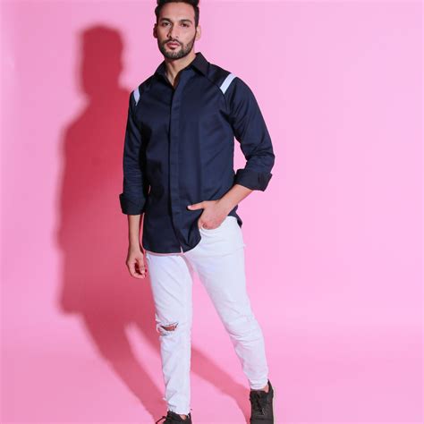 Blue shirt with white strip detailing on shoulders and back. – HTKD ...