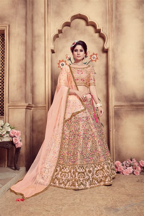 Peach Hand Work Foil Print And Soft Net Silk Lehenga Choli