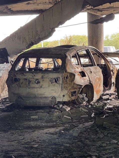 Jacksonville airport fire damages 50 cars. See the photos