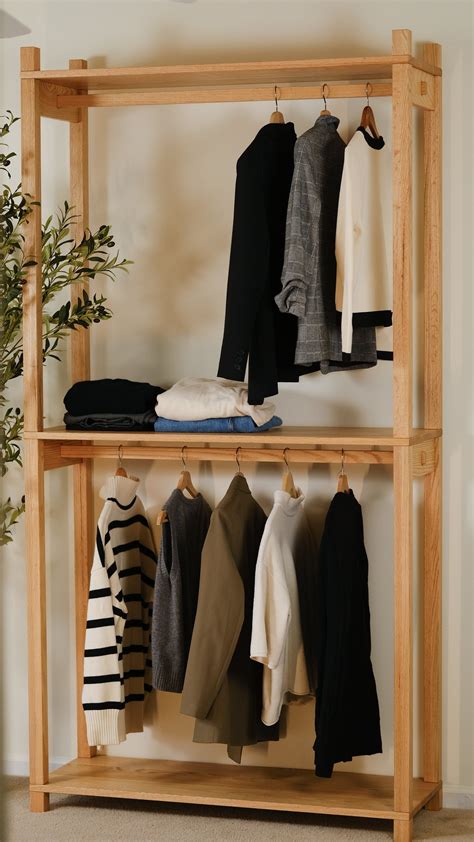 Minimalist two – tier oak wood clothing rack | Wood clothing rack ...