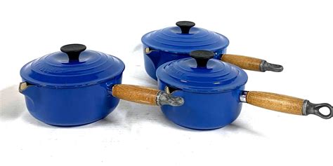 Lot - Three Le Creuset, France Blue Enamel Cast Iron Saucepans