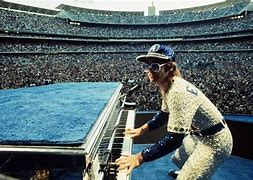 Image result for Elton John Playing Piano