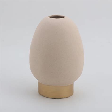 Buy Marshmallow Ceramic Human Face Vase from Home Centre at just INR 799.0