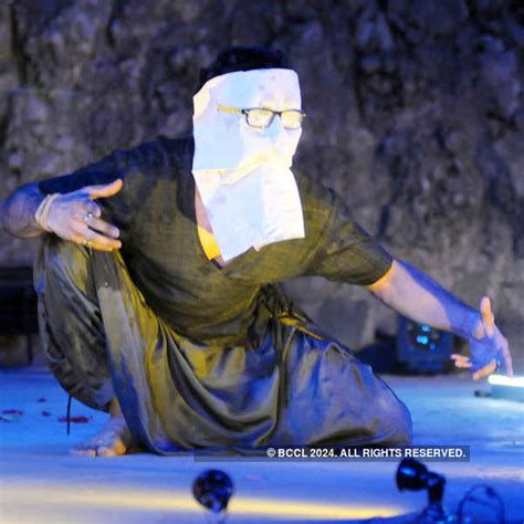An artist performs a scene from the play The Last Tale.