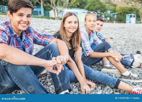 Teens on beach stock image. Image of casual, park, learning - 116787301