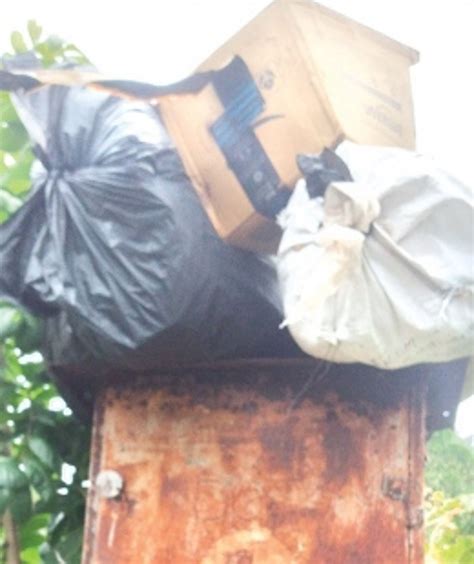 Garbage bags find place on telephone junction enclosure