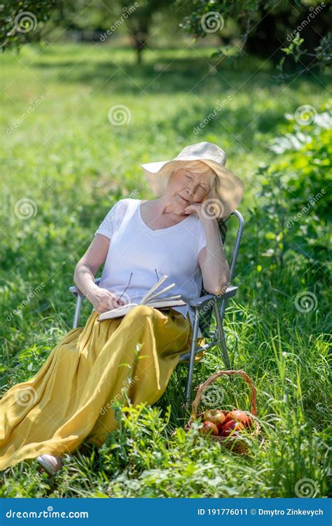See related image detail. Elderly Woman Sleeping in the Deck Chair with a Book Stock Image ...