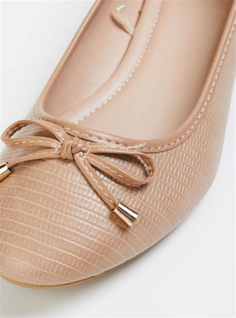 Buy Women Textured Bow-Detailed Ballerinas Online at just Rs. 699.0 ...