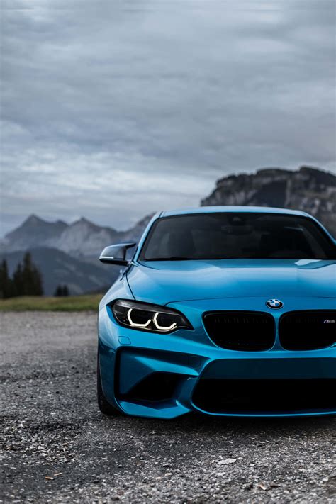Download Bmw Background Blue Color Car | Wallpapers.com