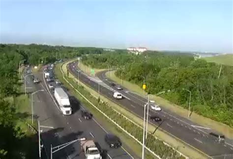 Work van careens into fence and utility pole; exit blocked on West ...