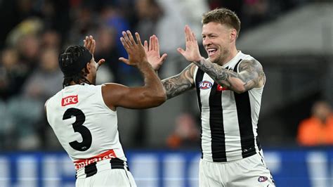 AFL Round 24 Collingwood Magpies massacre Essendon Bombers to seal ...