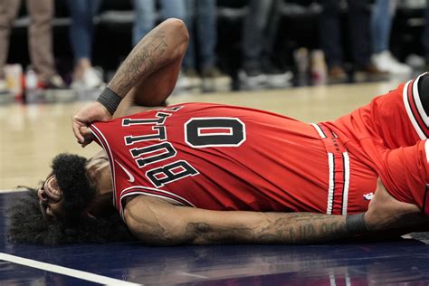 Bulls guard Coby White misses his first game of season with hip injury ...