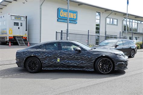 Mercedes-AMG Teases GT 4-Door Coupe Successor, Camo Will Come Off June 2025 - autoevolution