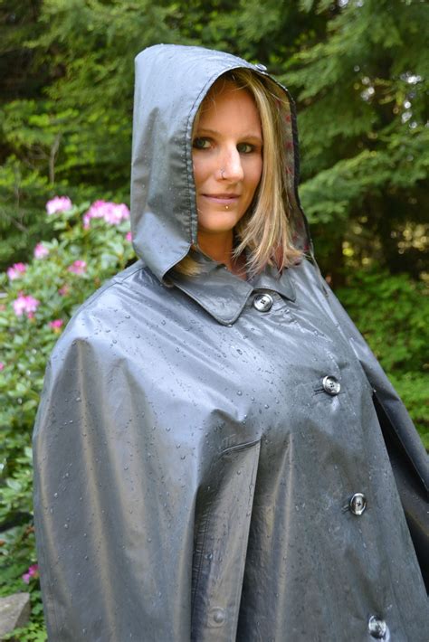 Well protected in her Klepper rubber cape | Rainwear girl, Rain fashion, Raincoat