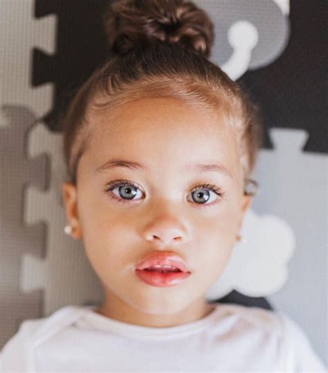 Hispanic Baby Girl With Hazel Eyes