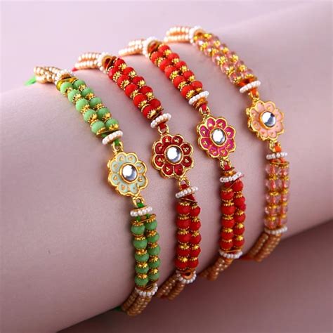 Send Sneh Meenakari Rakhi Set & Rasgullas to Qatar Online