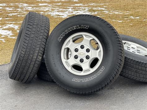 Silver 16” Chevy Silverado Wheels 6 Lug Rims Tahoe 33” Michelin Tires 6x5.5 Suburban for Sale in ...