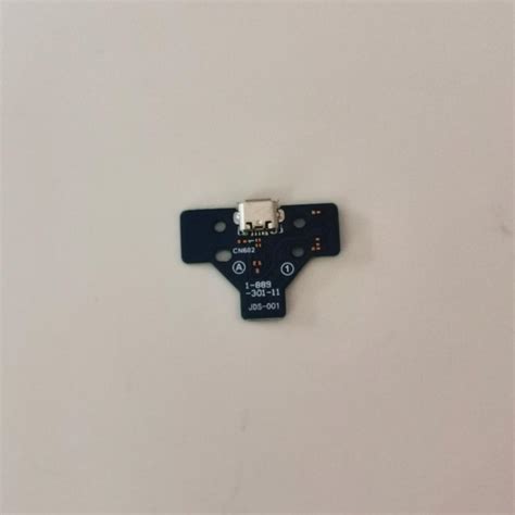 Image result for PS4 Controller Charging Port 12-Pin Connector