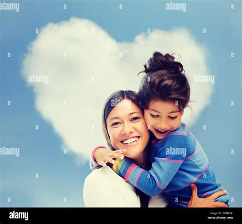 hugging mother and daughter Stock Photo - Alamy